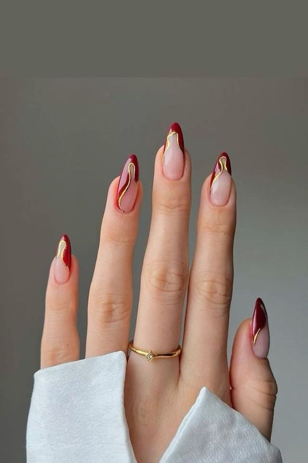 Crimson Flame Nails with Golden Swirl Accents