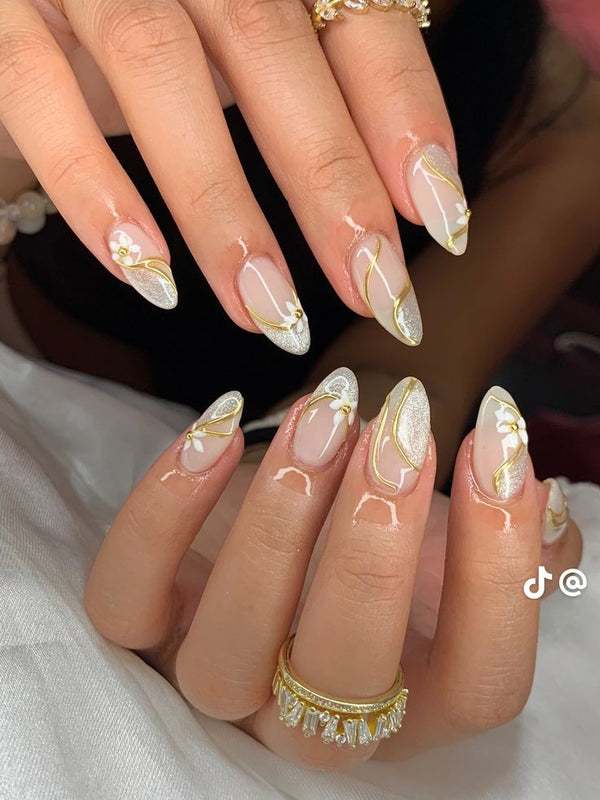 Golden Floral Swirl Nails