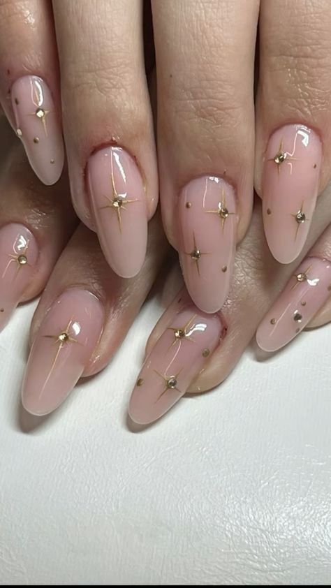 Nude Almond Nails with Gold Star